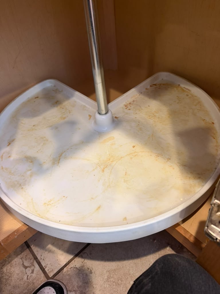 Kitchen corner cabinet before cleaning