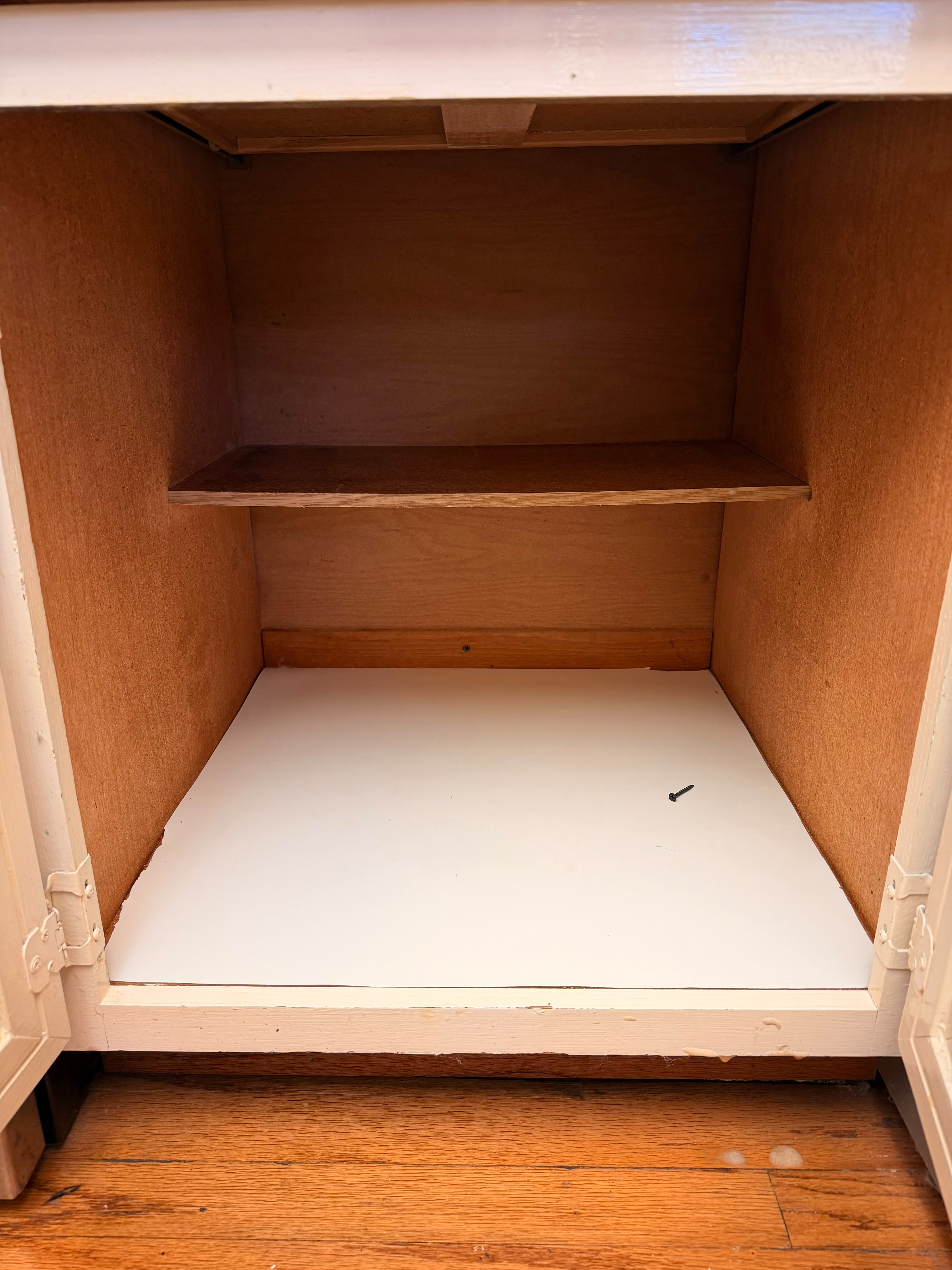 Kitchen cabinet interior cleaned and organized