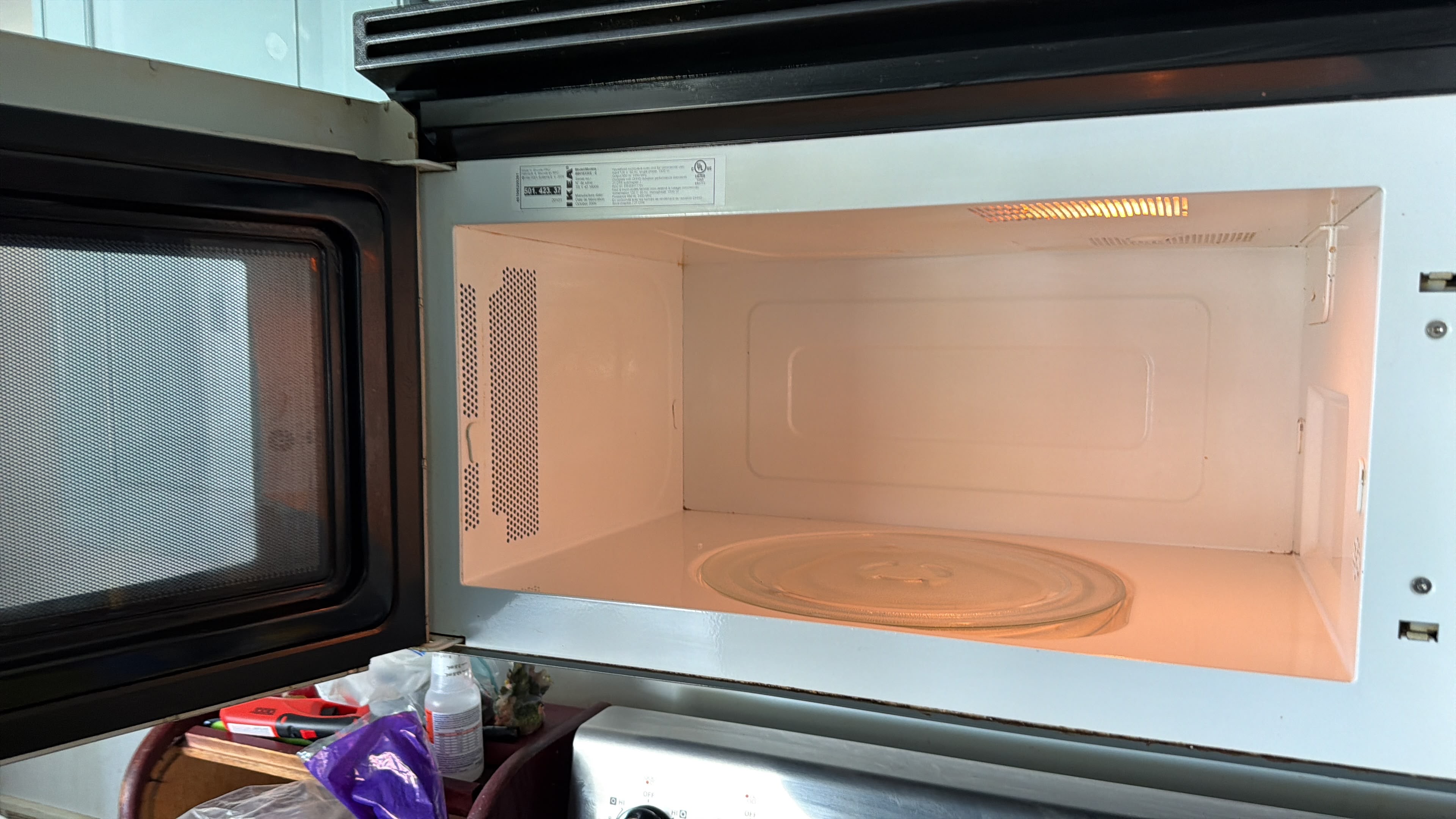 Microwave interior after cleaning — turntable and walls spotless