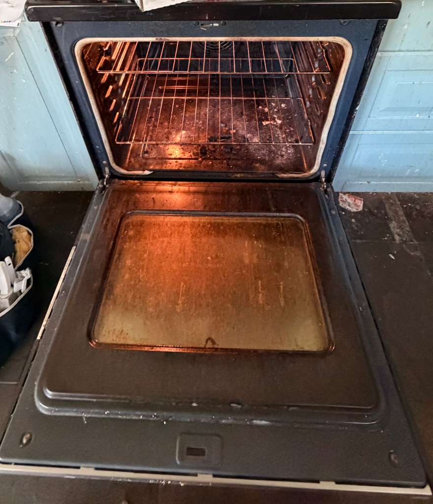 Oven before cleaning — moved to spotless after our service